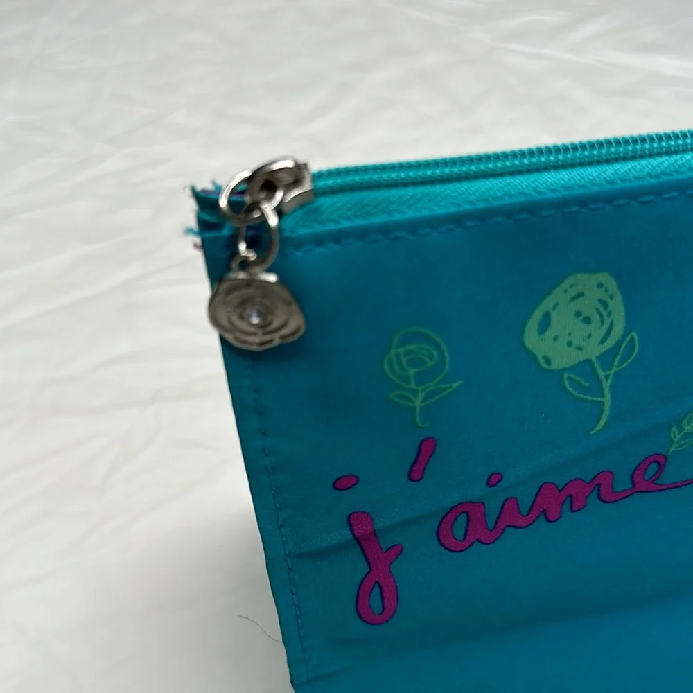 Lancôme Pink and Blue Floral Cosmetic Bag with Paris Text. 9” long x 6” tall.